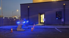 Drone docks are seen at dusk in the Santa Fe Police Department parking lot.