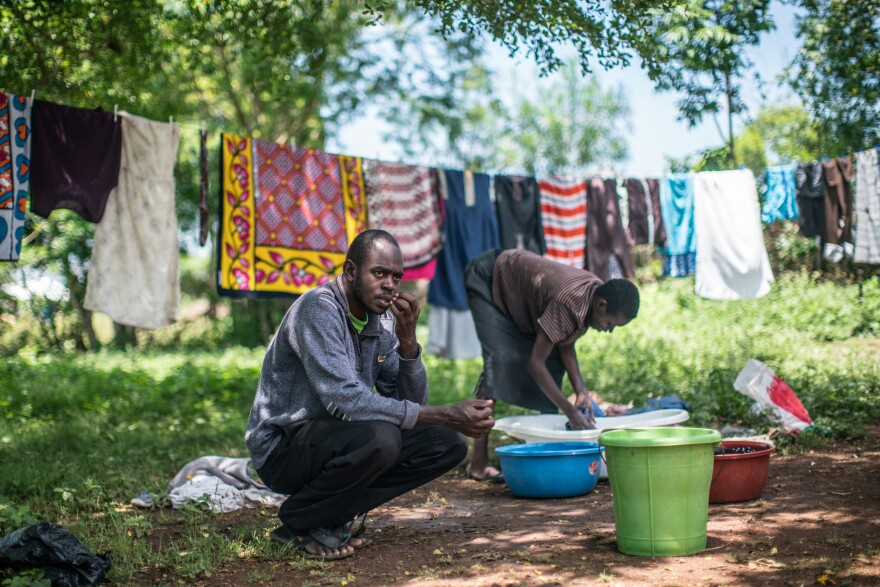 Dancan Odero at his family's compound. He has epilepsy, which makes it hard for him to work. His family says he's constantly trying to prove he can be useful.