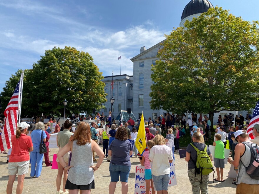 Roughly 400 people showed up at the State House Tuesday to protest Democratic Gov. Janet Mills’ recent mandate that healthcare workers get vaccinated against COVID-19.