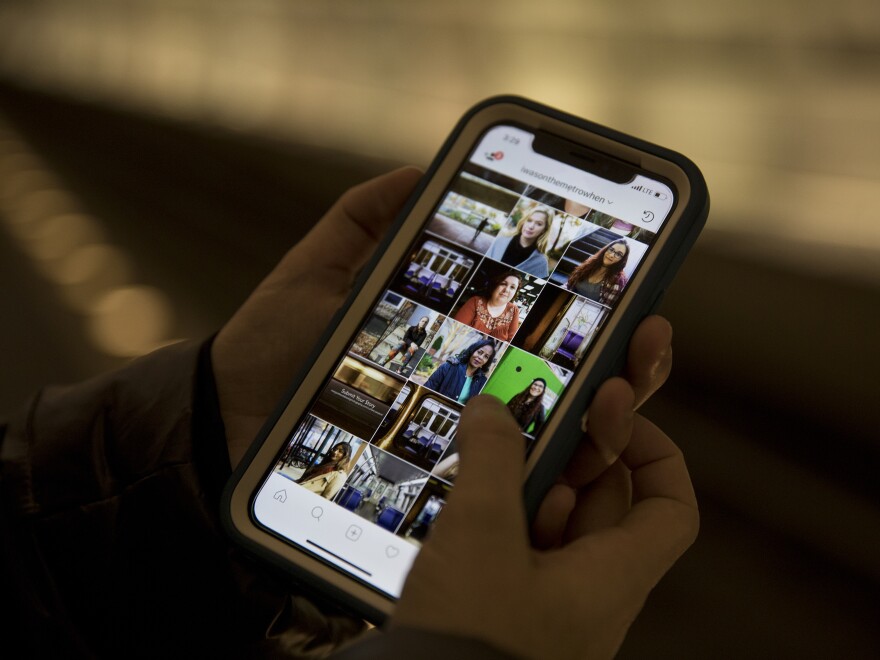 Margaret Wroblewski scrolls through the Instagram feed of her photo project. She aims to interview 50 riders who experienced sexual harassment on the Metro and eventually encourage Metro to use her images for anti-harassment posters on buses and trains.