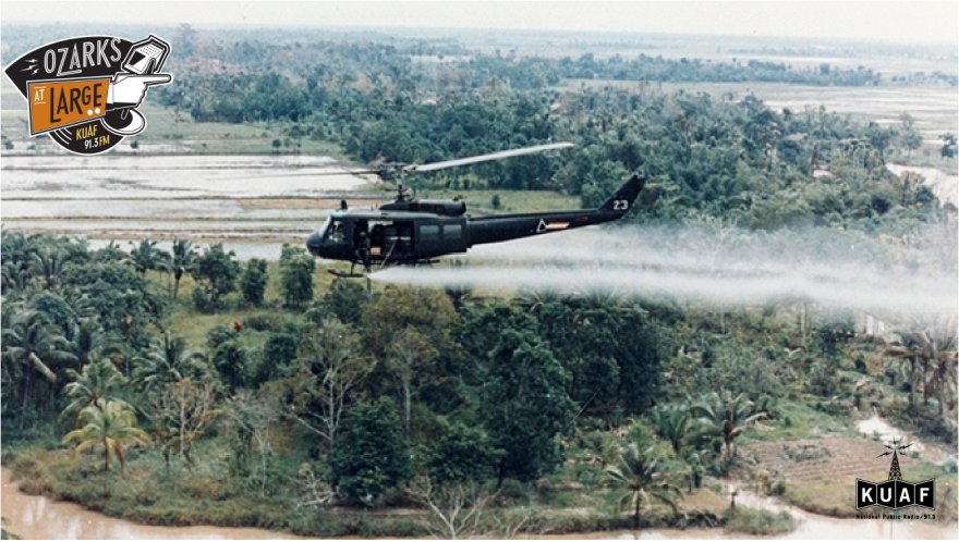 U.S. Army Huey helicopter sprays highly toxic defoliant called 'Agent Orange' over waterways and farm fields during the Vietnam War.