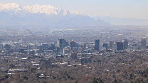 An overhead view of downtown Salt Lake City, Utah, as smog hangs over the city.