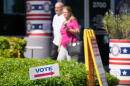 People walk from the Office of the Supervisor of Elections during early voting in the 2026 midterm elections, Tuesday, Oct. 27, 2026, in Doral, Fla. (Lynne Sladky/AP)