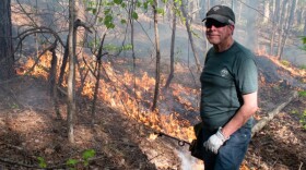 Jesse Wimberley, a fourth-generation burner, founded the Sandhills Prescribed Burn Association in 2015 to put fire back on the land. (Photo courtesy via Zachary Turner, WFAE)