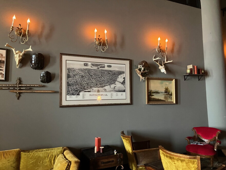 A map of Davenport is shown on one of the parlor room walls at The Half Nelson, 321 E. 2nd St.