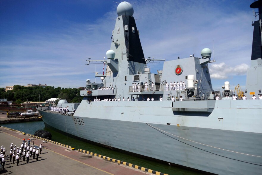 The British Royal Navy destroyer HMS Defender in the port of Odessa, Ukraine, on Tuesday. Russia said it fired warning shots at the warship Wednesday when it entered territorial waters off Crimea.