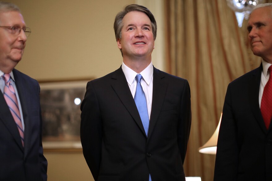 Senate Majority Leader Mitch McConnell (from left), Supreme Court nominee Brett Kavanaugh and Vice President Pence met on Capitol Hill Tuesday, ahead of meetings with Republican senators. Democrats vow to challenge Kavanaugh's nomination in upcoming hearings.