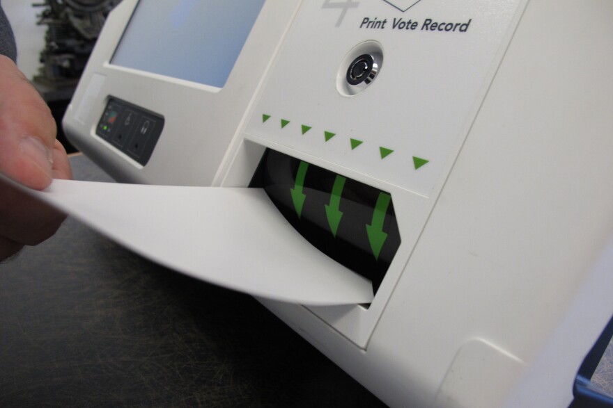 A digital voting machine demonstration in Raleigh. An upcoming hand-to-eye audit of Forsyth County ballots will measure the accuracy of machines used this year on Election Day. (AP Photo/Allen G. Breed, File)