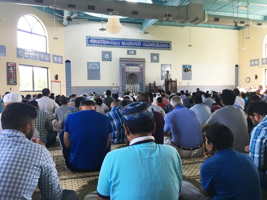 Men attend Friday prayers at a mosque in Edison, N.J.