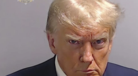 This booking photo provided by Fulton County Sheriff’s Office, shows former President Donald Trump on Thursday, Aug. 24, 2023, after he surrendered and was booked at the Fulton County Jail in Atlanta. Trump is accused by District Attorney Fani Willis of scheming to subvert the will of Georgia voters in a desperate bid to keep Joe Biden out of the White House.