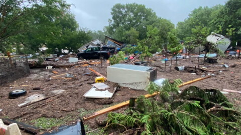 Sandy Creek flooding in Travis County on July 5, 2025, left debris strewn across a small orchard