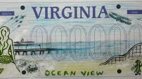 Larry Estes’ winning design for a new Ocean View license plate blends the neighborhood’s past and present, with a mermaid, a roller coaster from the old amusement park and a 1910 warship takeoff.