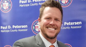 Paul Petersen, seen here while still assessor for Maricopa County in Arizona, has acknowledged running an illegal adoption scheme involving women from the Marshall Islands.