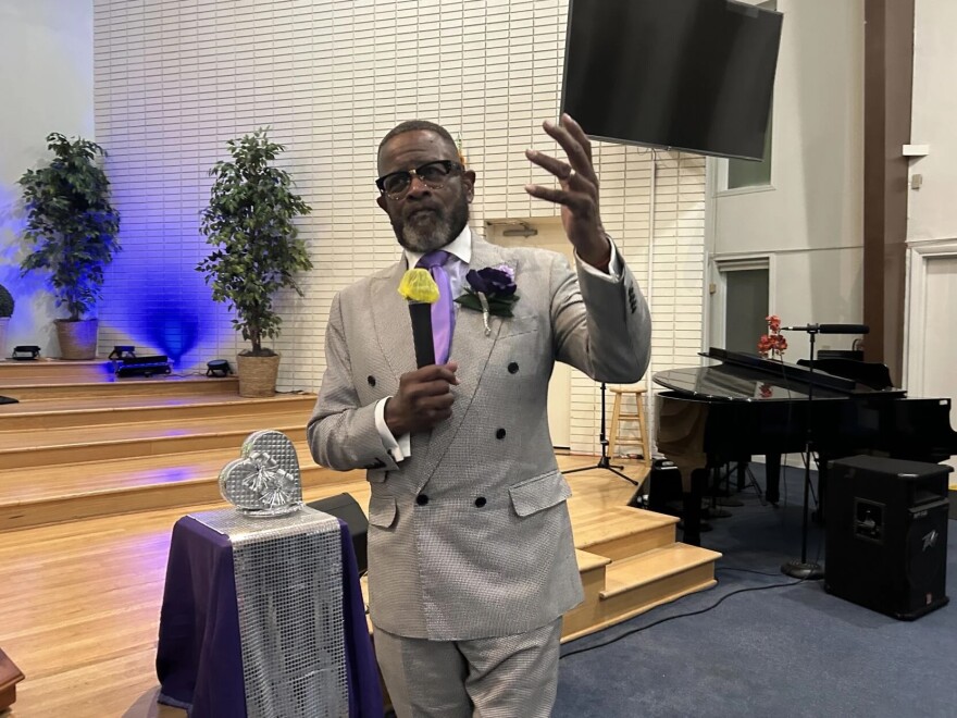 Pastor Calvin Hopkins sends off the centennial with his closing remarks.