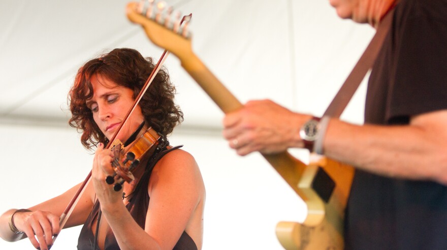 Violinist Jenny Scheinman and guitarist Bill Frisell perform at the 2012 Newport Jazz Festival.