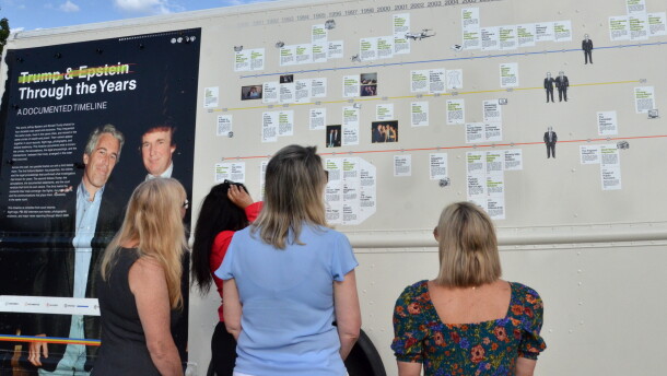 The outside of the Trump-Epstein Bookmobile shows a timeline of Trump, Epstein, and their relationship shown in documents from the Epstein files.