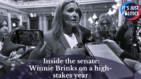 Winne Banks being interviewed by reporters 