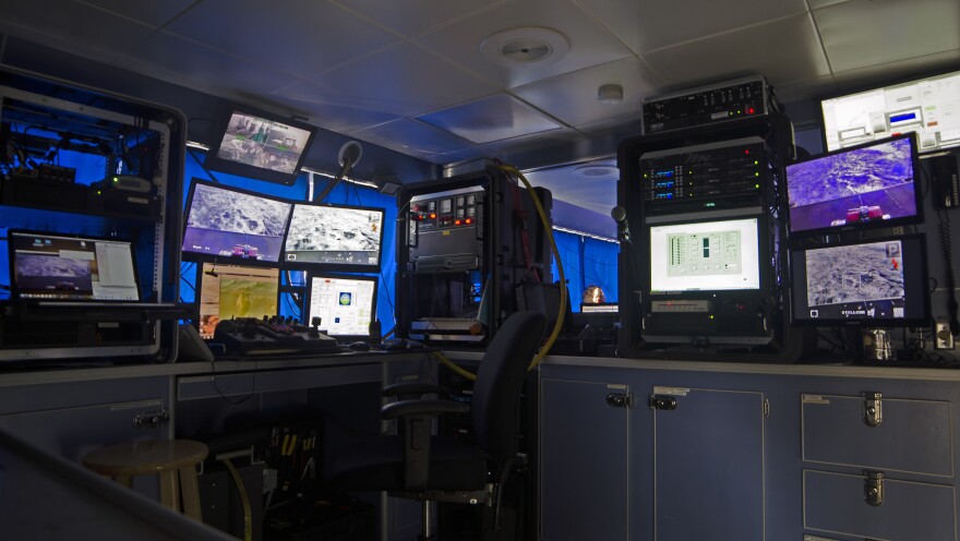 A view of the pilot's equip aboard the ship as an ROV explores the ocean floor.