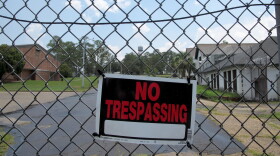 In this July 13, 2011 photo,  the buildings that housed the Dozier School for Boys is locked after if closed and about 200 employees  were laid-off . The reform school was a  steady employer for 111 years in Jackson County. (AP Photo/Brendan Farrington)