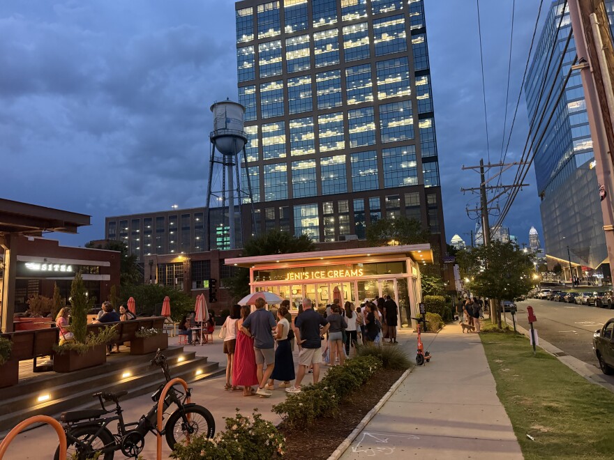 People wait in line at Jeni’s Splendid Ice Creams in Charlotte’s South End neighborhood.