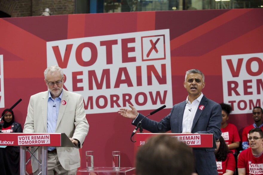 London Mayor Sadiq Khan, right, makes an address flanked by the leader of Britain's opposition Labour Party Jeremy Corbyn during a European Referendum "Remain" rally in London, Wednesday, June 22, 2016. (AP Photo/Matt Dunham)