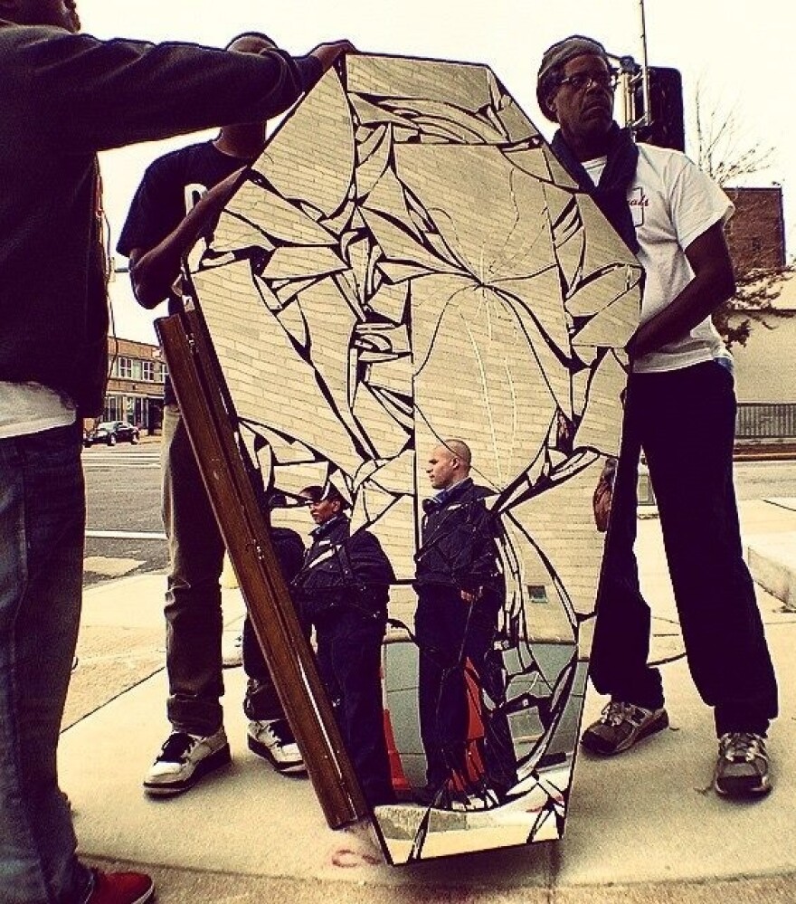 Artivists created their Mirror Casket using mirrors from Goodwill and dollar stores, plywood and sealant. 