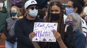 Lacey Davis joined about 250 people gathered for a public “I Can’t Breathe” rally protesting the death of a black man, George Floyd, who was killed after a white officer pressed a knee into his neck while taking him into custody in Minnesota. People held signs decrying violence against black people and calling out institutional racism, many supporting the Black Lives Matter movement on Saturday, May 30, 2020 in Juneau, Alaska. Similar protests happened throughout the state with hundreds turning out in Fairbanks and Anchorage, they’ve also erupted in dozens of cities all over the country. (Photo by Rashah McChesney/KTOO)