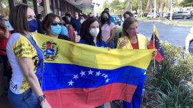 Venezuelans holding flag