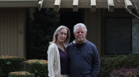Elaine Sheffer and Patrick Turner stand together in front of their home near Sacramento, CA.