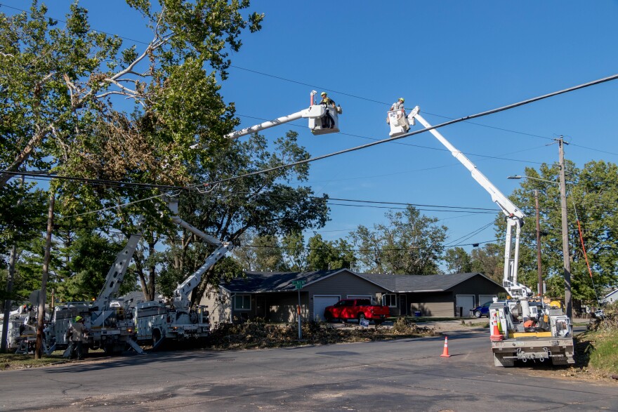  Crews in Iowa repair power lines damaged by the August 2020 derecho. Some Iowans were without power for a week. Utility companies say since that derecho, they’ve improved their communications with towns and cities so they can restore power as quickly as possible.