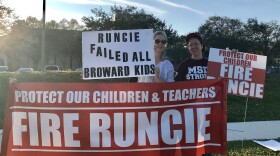 About a dozen parents joined a peaceful protest against Broward Schools Superintendent Robert Runcie outside of Marjory Stoneman Douglas High School, on Feb. 4, 2019.