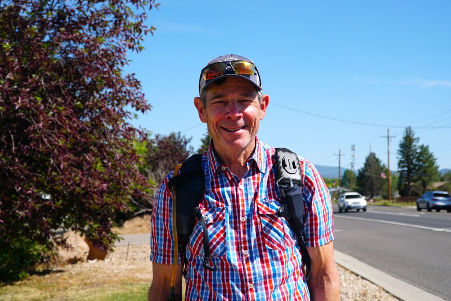 U.S. Sen. John Curtis walks down Kamas' Main Street on Thursday, July 2, as part of his 250-mile walk honoring the 250th anniversary of the United States.