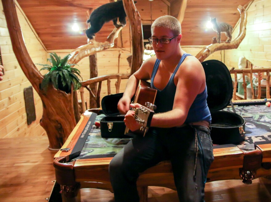 Colt_with_bear_bobcat_cr_0.jpg