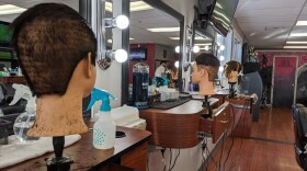 Student barbers at Hair Science practice on mannequins as well as on live clients February 26, 2020. (Mayowa Aina/Alaska Public Media)