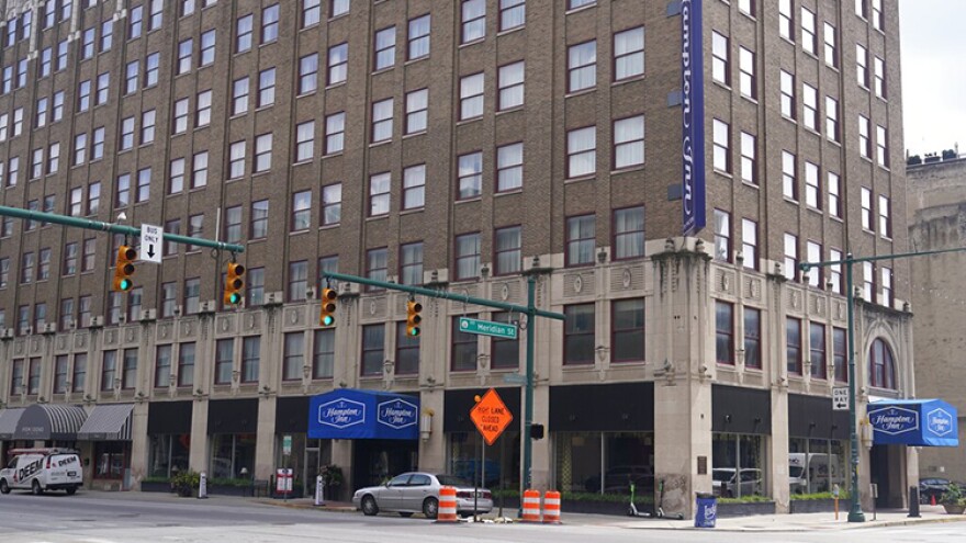 The Hampton Inn photographed, Monday, Aug. 29, 2022, in Indianapolis. Three members of the Dutch Commando Corps, who were training at a center, were shot outside of the hotel in downtown Indianapolis early Saturday morning. The Dutch Defense Ministry says that one has died.