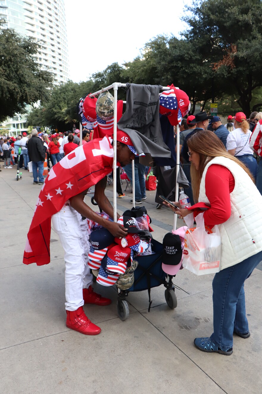 Vendors line the streets selling Trump-themed merchandise.