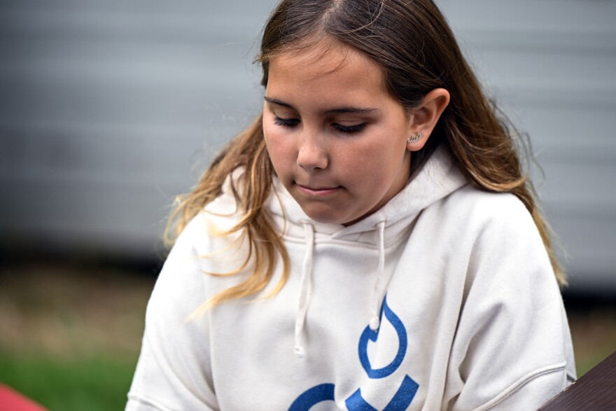 Alida Elliott-Bocassi 11, of Greenwich during an interview at Experience Camps, a free grief camp for kids whose parent died, that expanded to Connecticut this year. This is how kids are healing at Camp KenWood and KenMont, in Kent, Connecticut August 20th 2025.