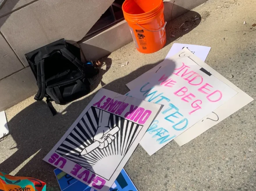 Signs prepared for a protest rally at Brown University on Tuesday, March 11, 2025.