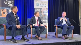 Panelists speak during the Housing to Protect Cape Cod summit, Oct. 17, 2024. From left: Paul Niedzwiecki, CEO of the Cape Cod Chamber of Commerce; Eric Shupin, chief of policy, Executive Office of Housing & Livable Communities; and Edward Augustus, Massachusetts secretary of housing and livable communities.