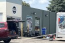 Authorities loading goods from Midwest Exchange in Bloomington onto a U-Haul van.