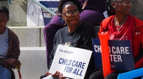 Hoosiers protest child care voucher cuts in front of the Indiana Statehouse, in Indianapolis, on Friday, Oct. 10, 2025.