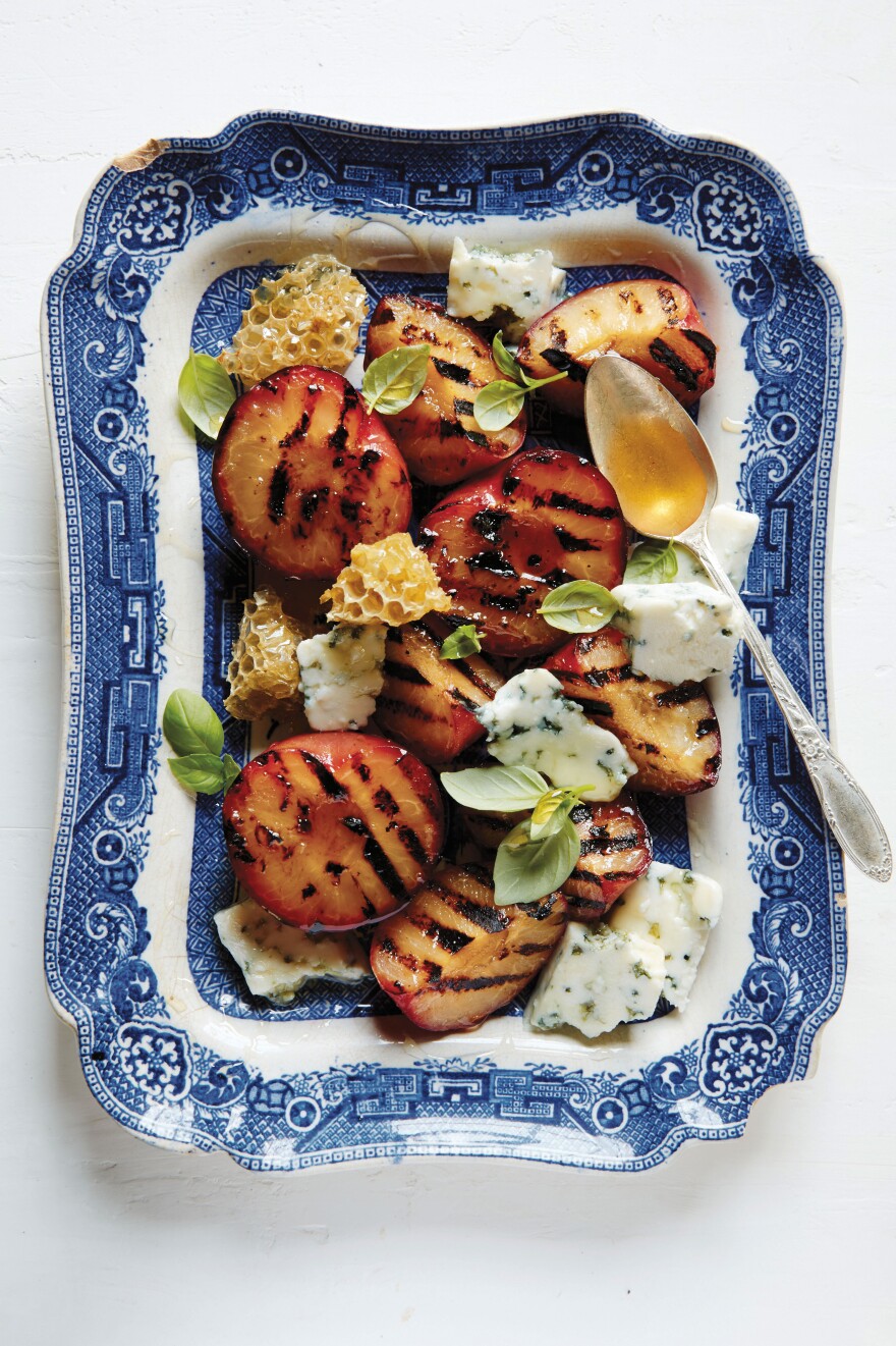 A grilled stone fruit, blue cheese and honey dish from The Lost Kitchen