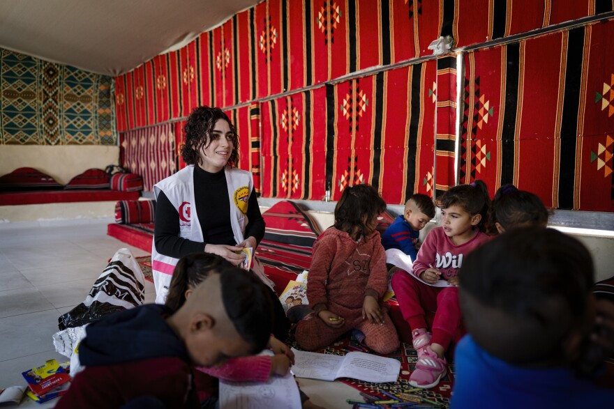 Psychologist Redah Hussin leads an art therapy class for Bedouin children. Between an uptick in settler violence and the war in Gaza, Palestinians are dealing with multiple mental health stressors.