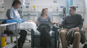 Lesley Manville (center) and Liam Neeson (right) in "Ordinary Love." (Aidan Monaghan/Bleecker Street)