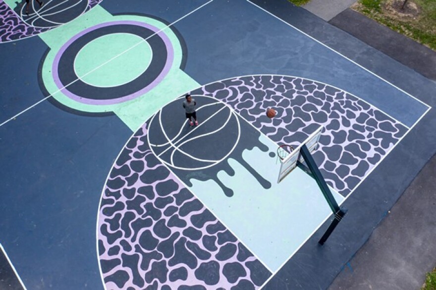 The basketball court at Marktetview Lodge was the first city court to received a fresh coat of paint courtesy of Peculiar Asphalt, a city-run program that brings Rochester residents, ages 16 to 20, together to design and paint murals on city basketball courts.