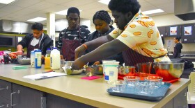Students in a nutrition class at Pike High School make smoothies.