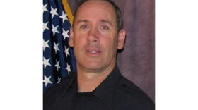 This photo tweeted by the Boulder Police Department late Monday, March 22, 2021, shows Officer Eric Talley. Police say multiple people have been killed in a shooting at a supermarket in Boulder, Colo., including Talley.