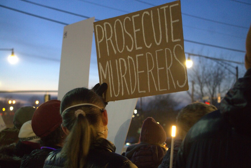 Hundreds of demonstrators lined Pattonwood Drive in Irondequoit near the U.S. Customs and Border Protection's Rochester border patrol station on Thursday, Jan. 8, 2026, protesting an ICE agent's deadly shooting of a woman in Minneapolis.