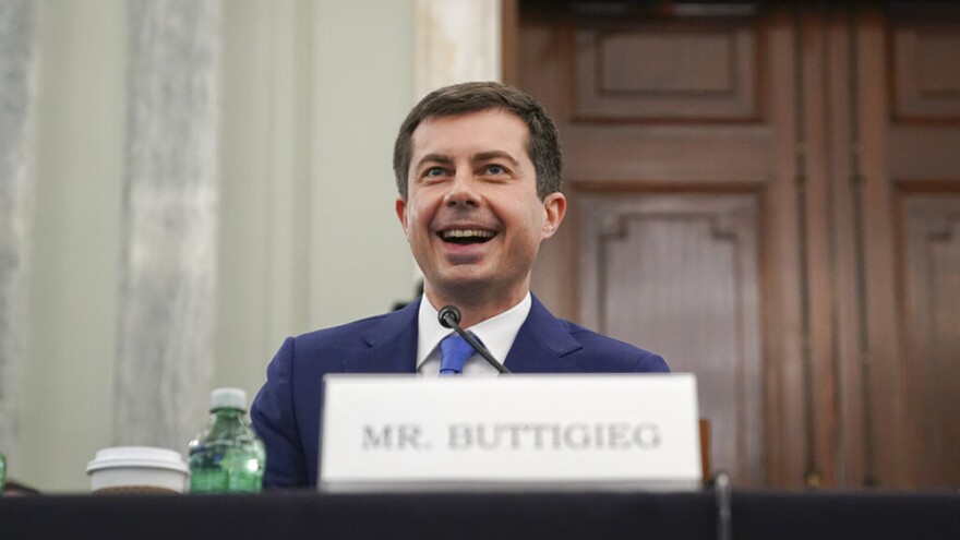 Transportation Secretary nominee Pete Buttigieg smiles during a Senate Commerce, Science and Transportation Committee confirmation hearing on Capitol Hill, Thursday, Jan. 21, 2021, in Washington.