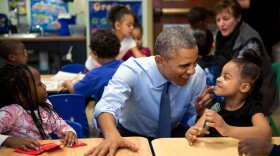 "While we were in Lawrence, Kan., we stopped at the Community Children's Center–one of the nation's oldest Head Start providers. The president sat next to Akira Cooper, right, and reacted to something she said to him." (Official White House Photo by Pete Souza)